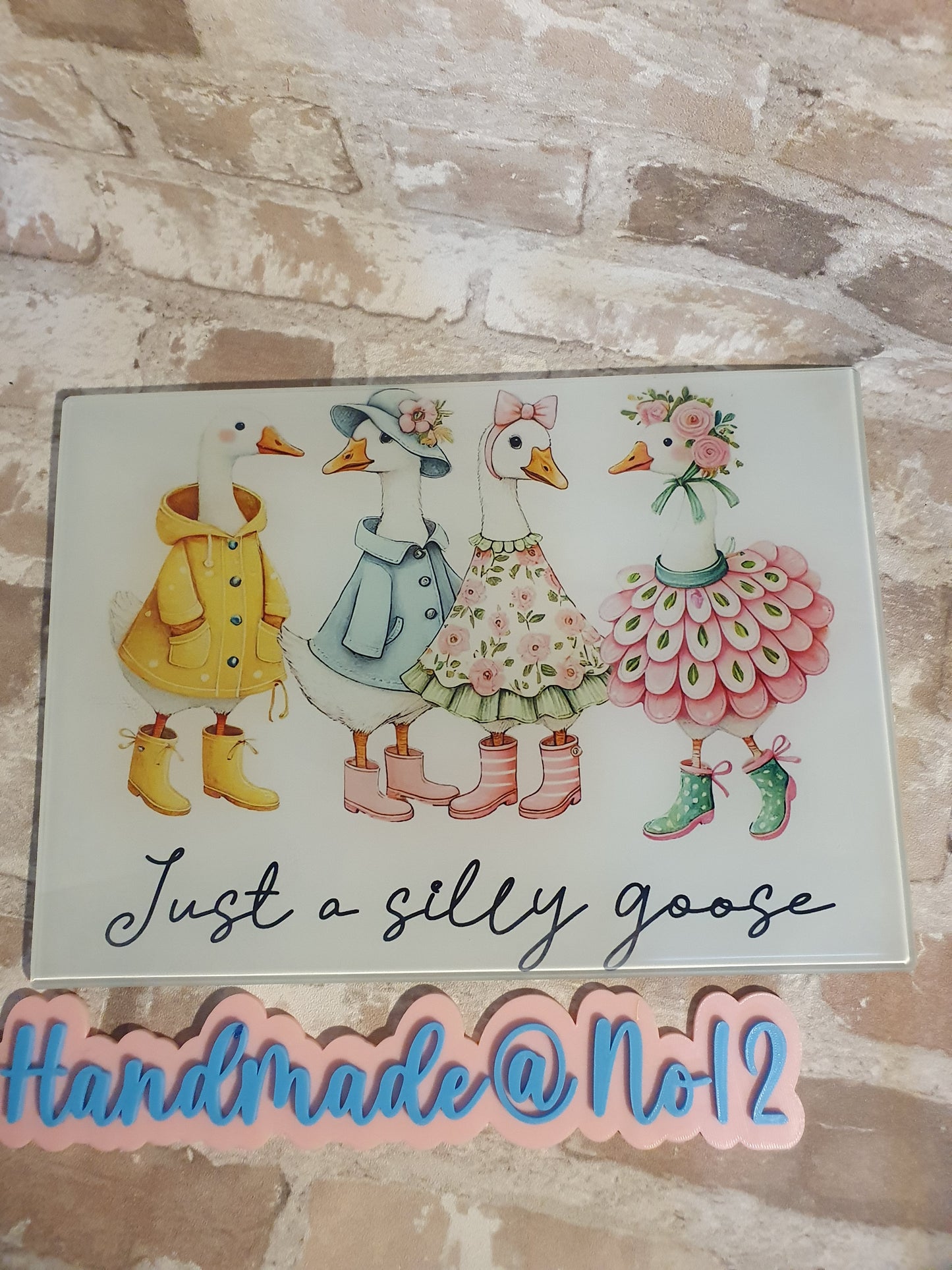 Silly goose glass chopping board