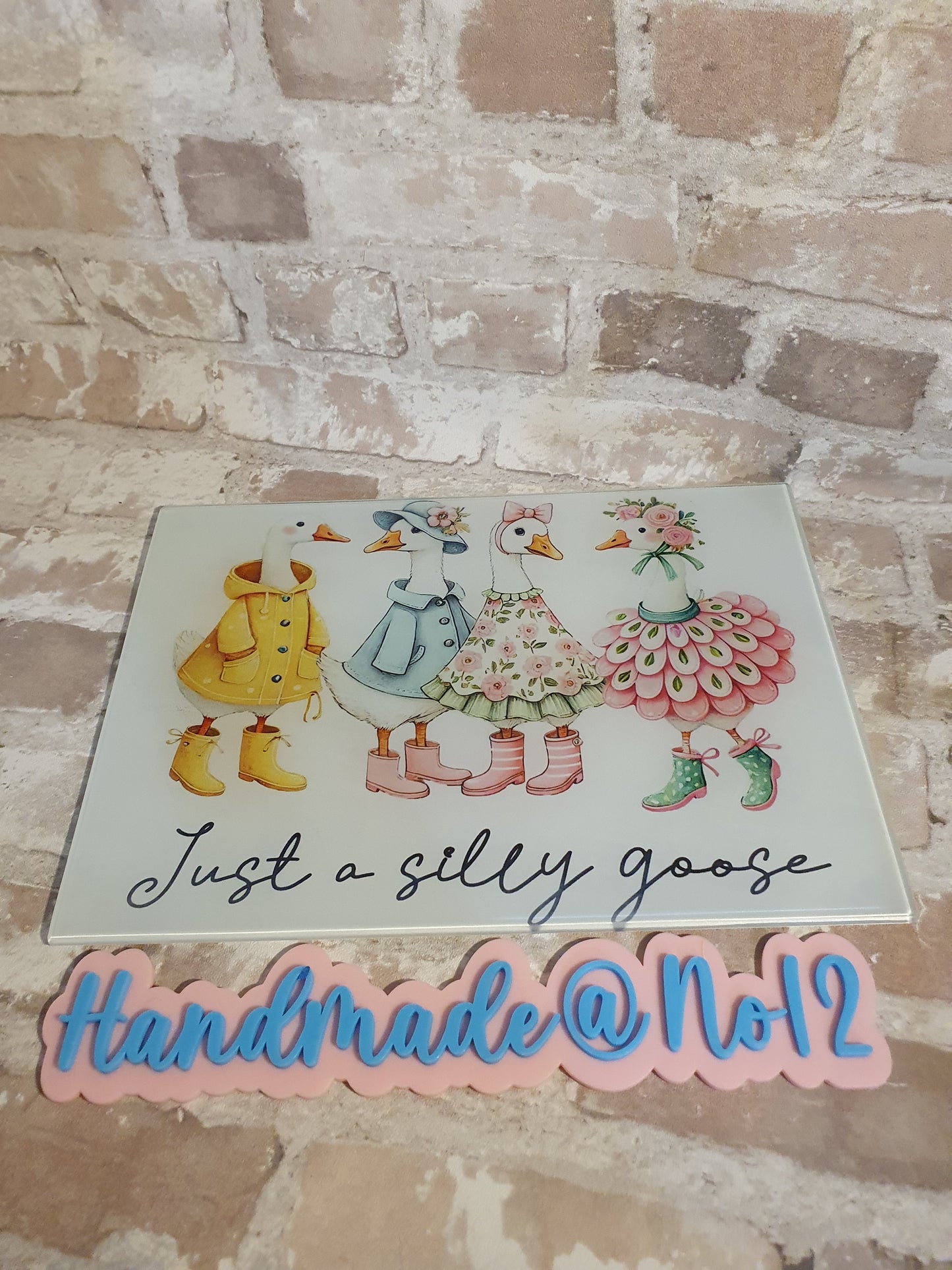 Silly goose glass chopping board