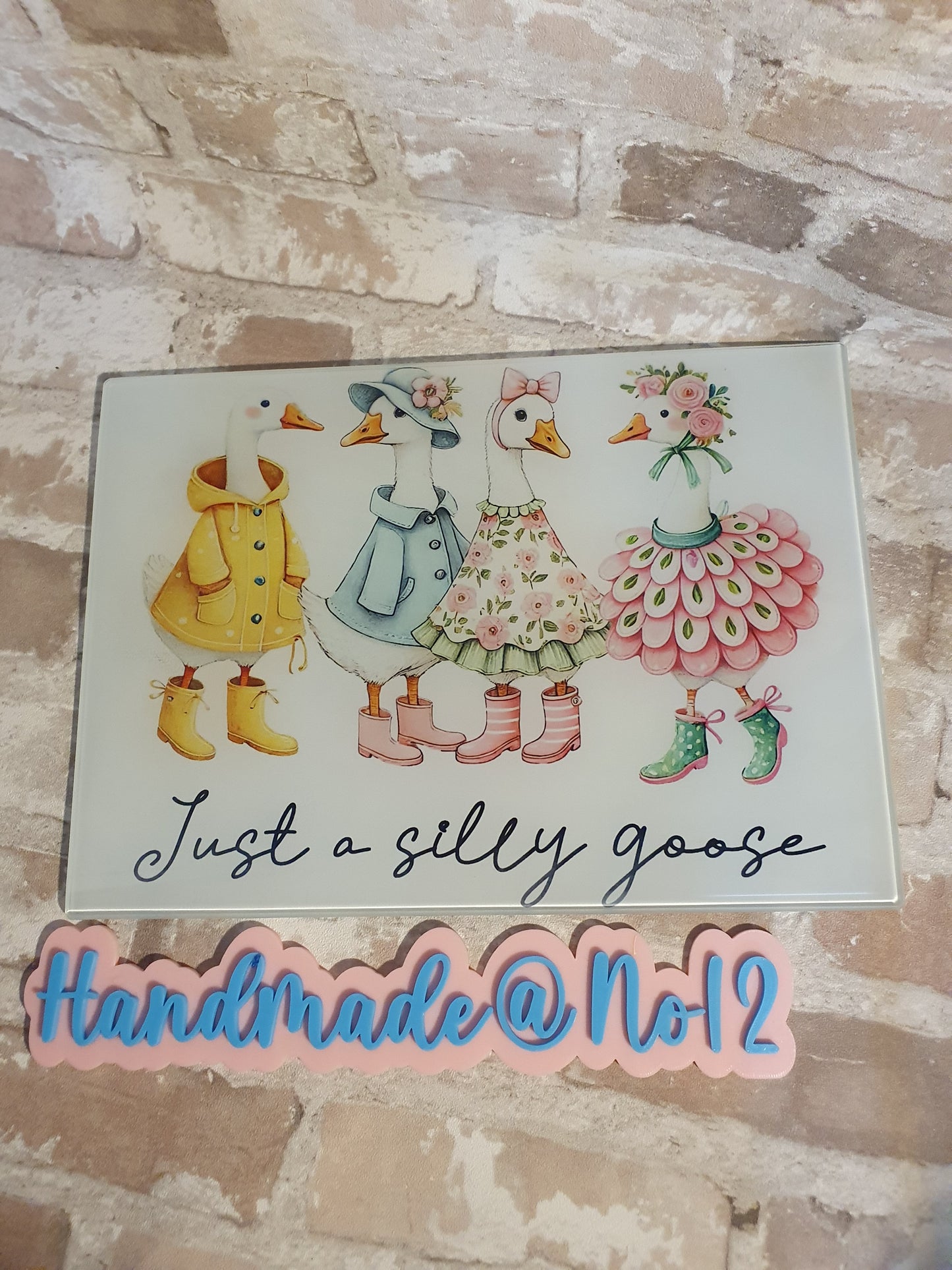 Silly goose glass chopping board